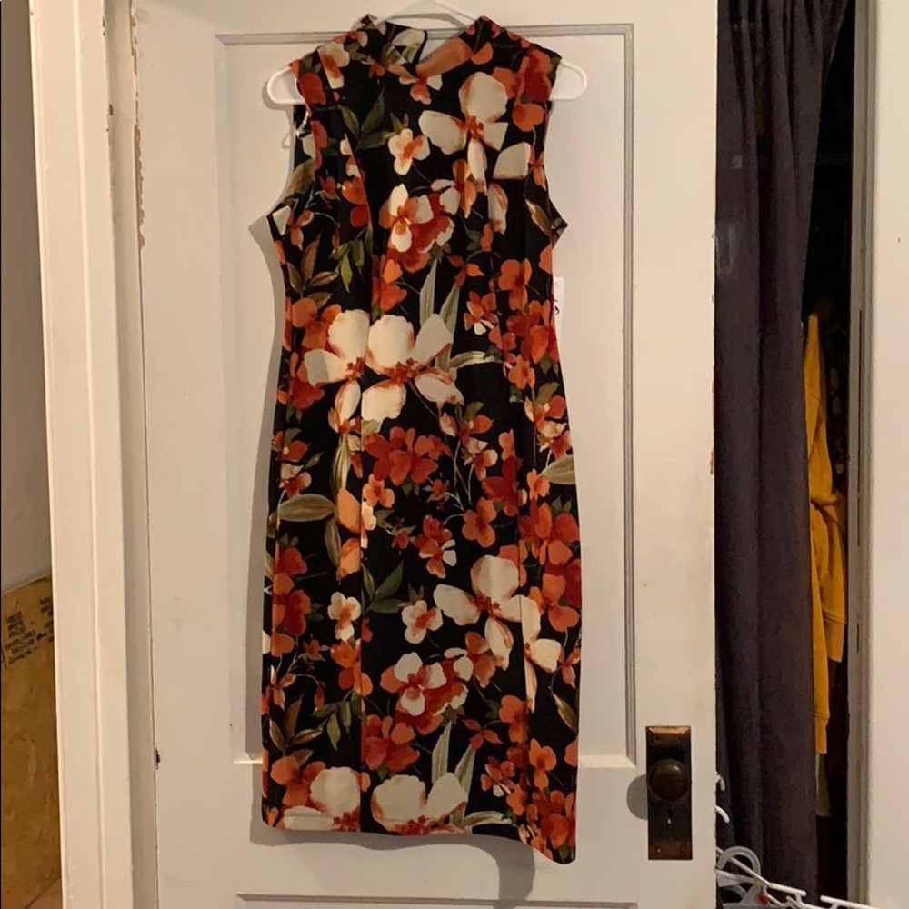 Below the knew flowered dress